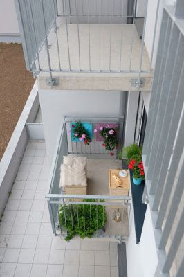 BALCONY WITH BLOOMING WALLS